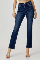 Midrise ADELINE Jeans by Risen in dark wash, styled with a trendy top and sandals for chic looks.