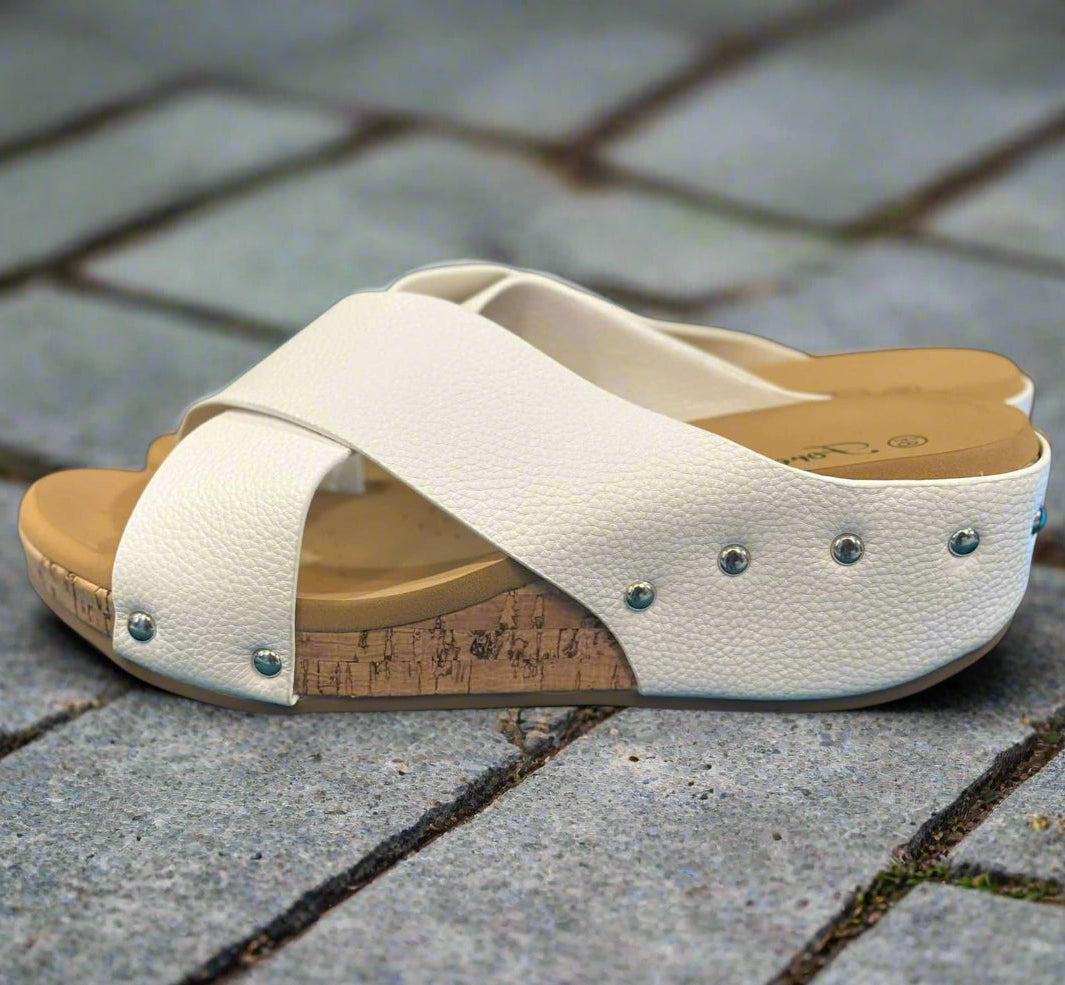 Stylish Sugar Stroll wedge sandals with white faux leather and cork sole, perfect for sunny days.