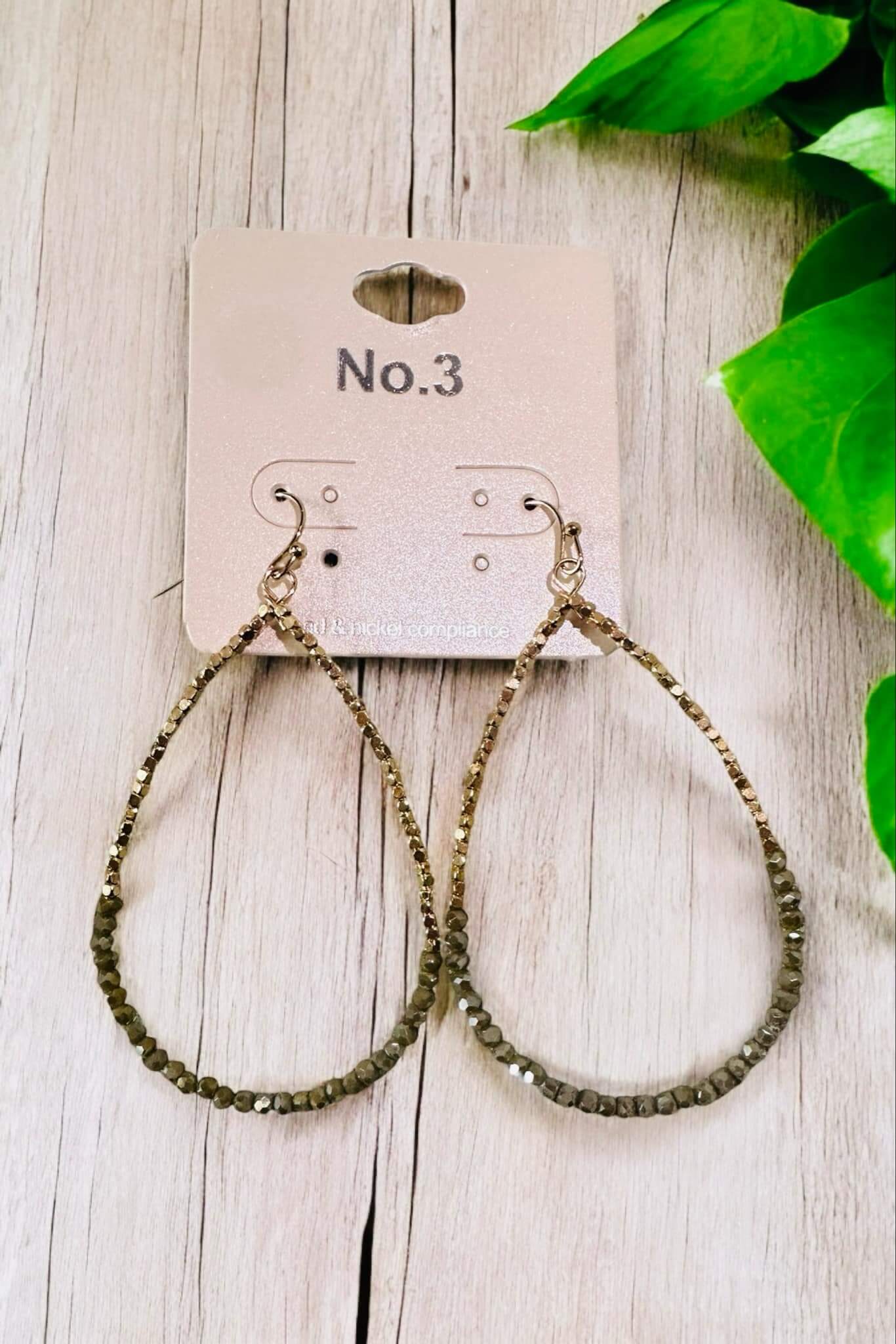 Sharla Beaded Earrings by No. 3 Jewelry in teardrop shape with colorful beads and gold accents.