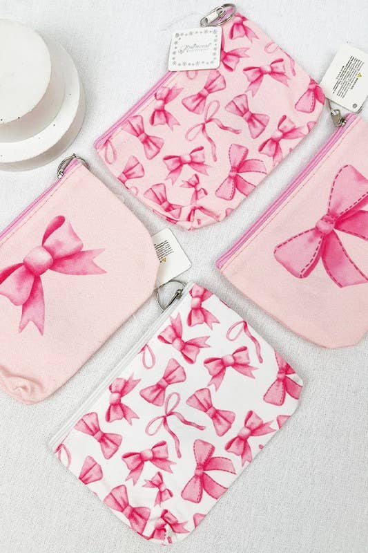 BOW ME OVER COSMETICS BAG collection with pink bow designs, perfect for organizing makeup essentials.