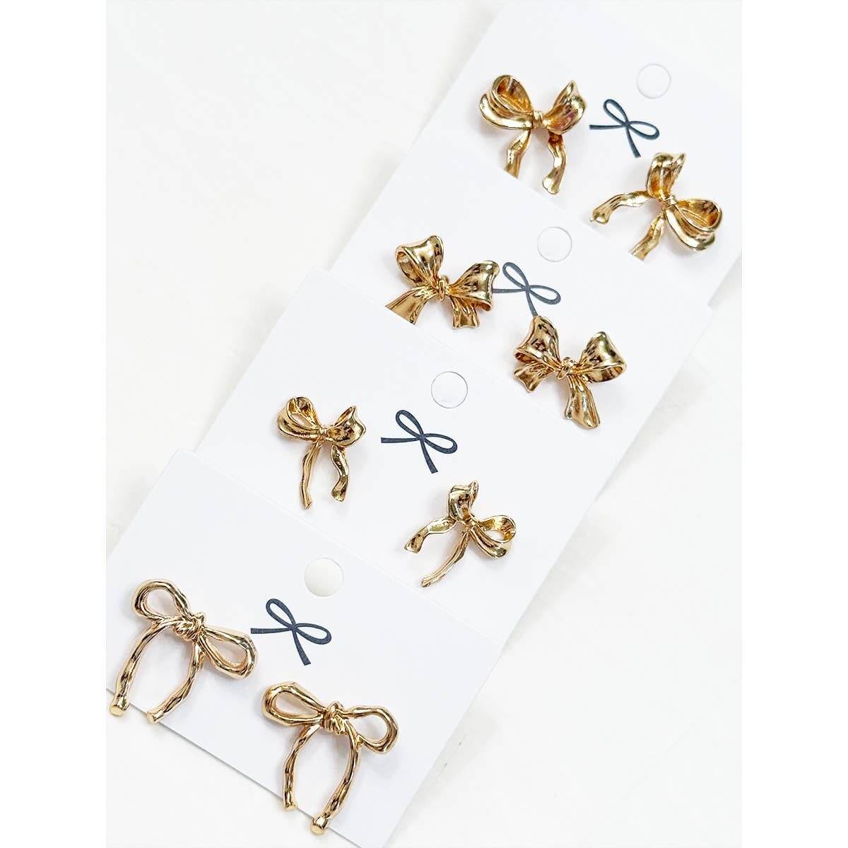 Bows Before Beaus gold bow earrings collection by Love and Repeat featuring four playful styles.