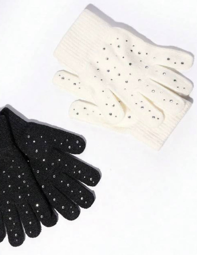 STILL BEJEWELED gloves in winter white and jet black adorned with rhinestones for a stylish winter accessory.