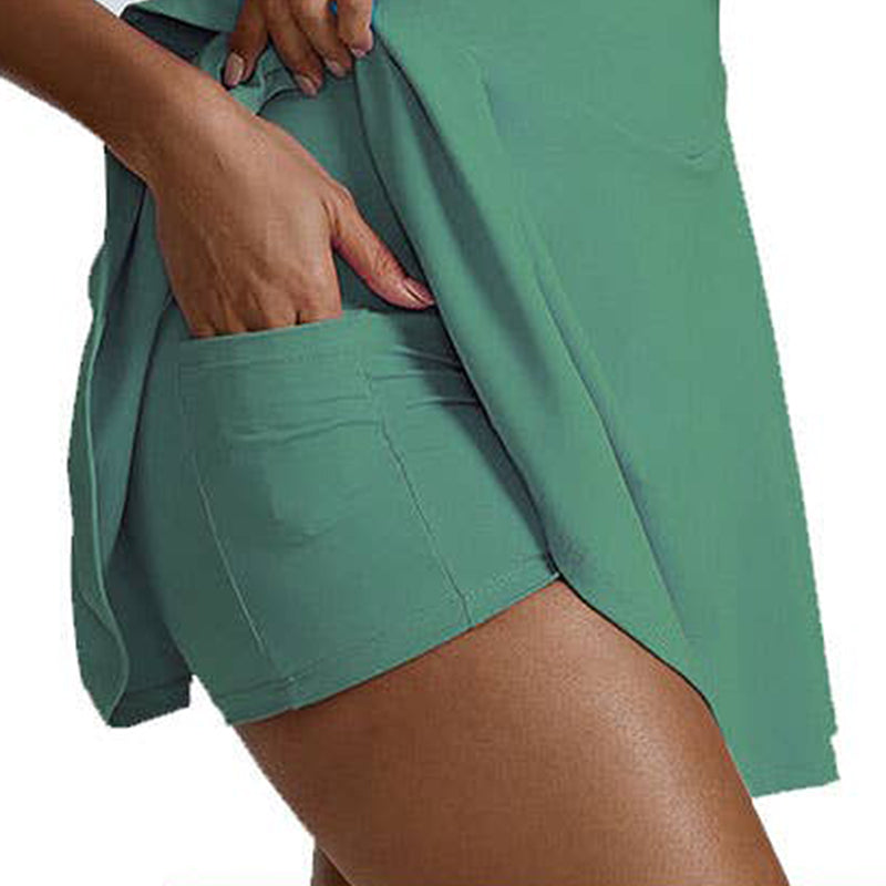 Close-up of the Power Play Dress in jade by Otos New York, showcasing its pocket and stylish design.