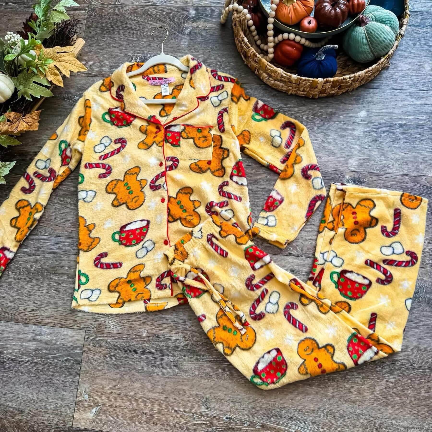 GINGERBREAD SNUGGLES PJ's by Love to Sleep, cozy fleece pajamas with gingerbread men and candy cane print.
