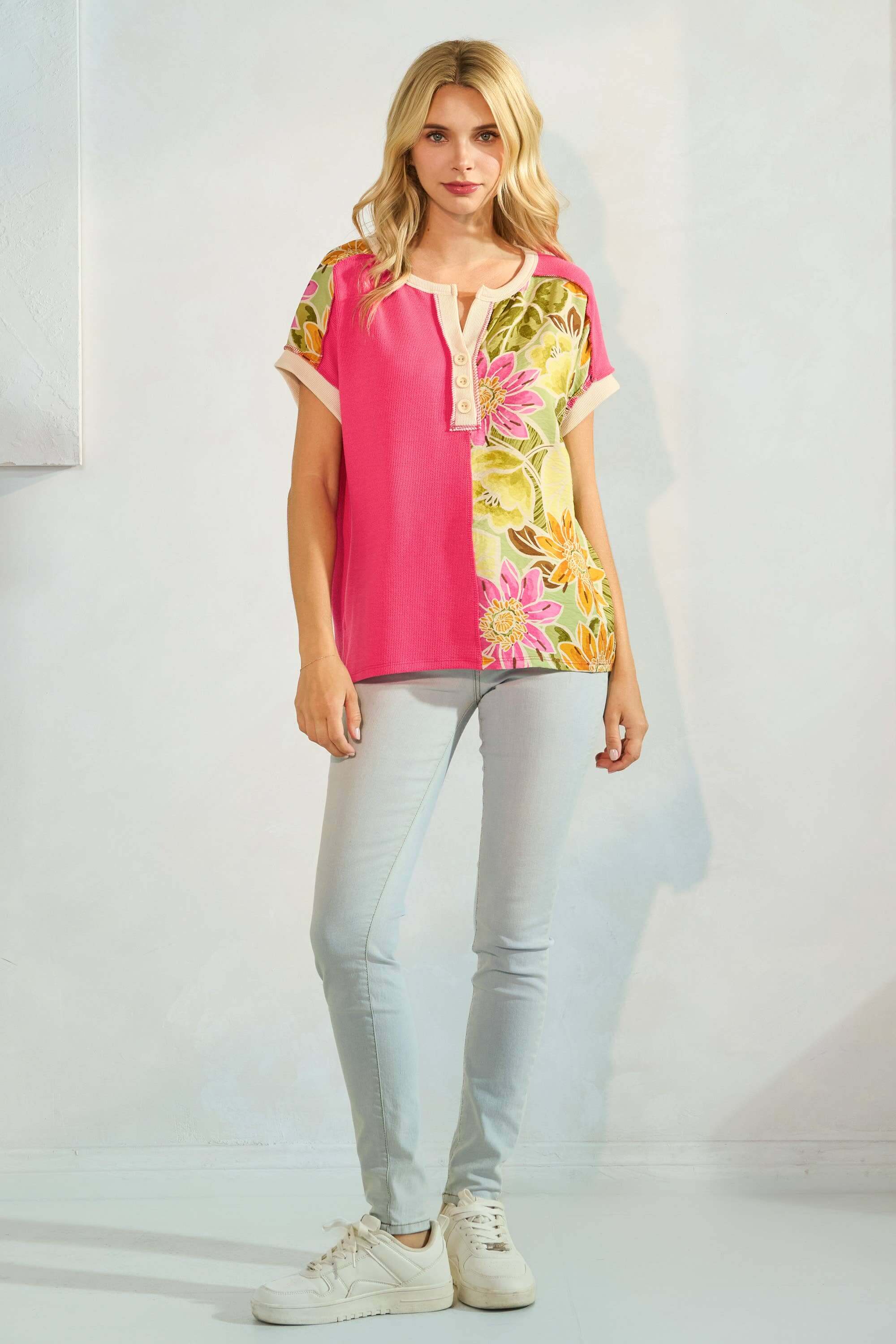 Fuschia floral colorblock ribbed tee, Weekend Getaway Top from 7th Ray, styled with light jeans and casual sneakers.