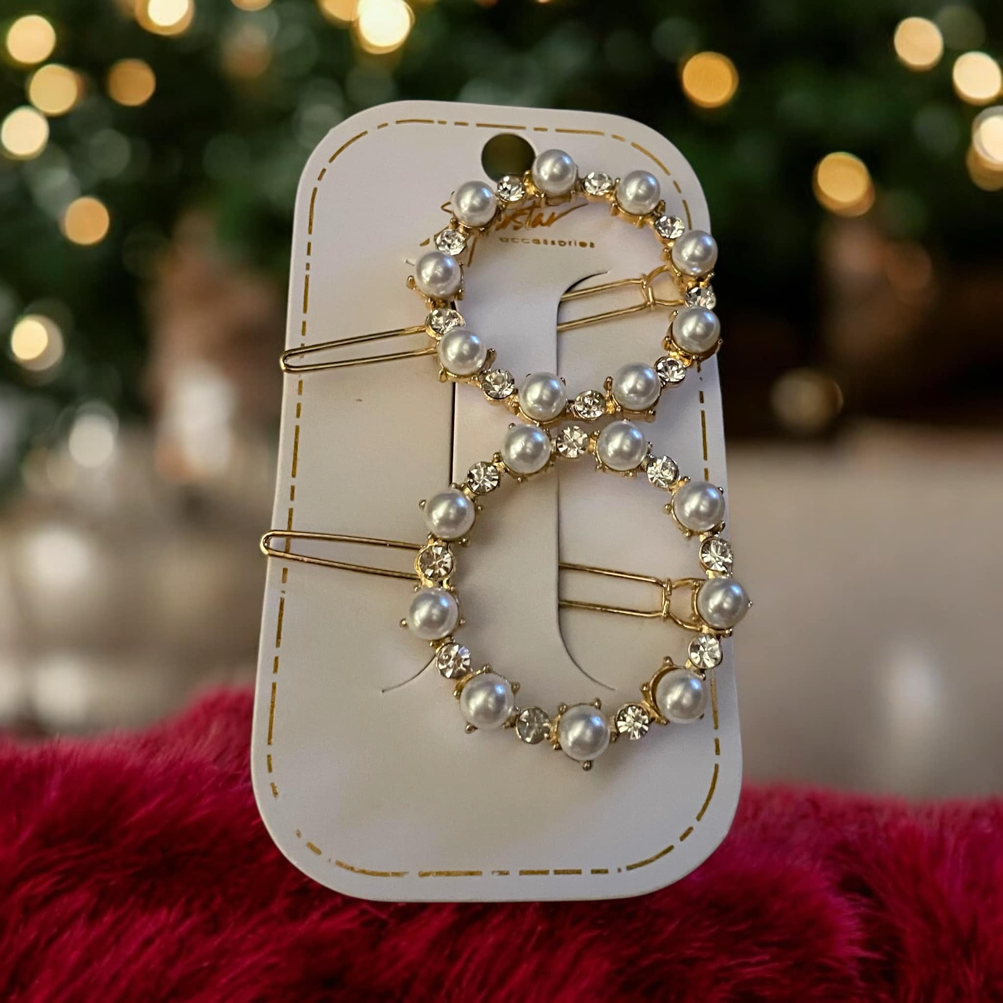 Set of two gold tone barrettes with faux pearls and rhinestones, round and heart shapes, perfect holiday accessory.