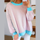 SALTWATER TAFFY TOP featuring soft pink and aqua stripes with a stylish high-low design and comfortable fit.