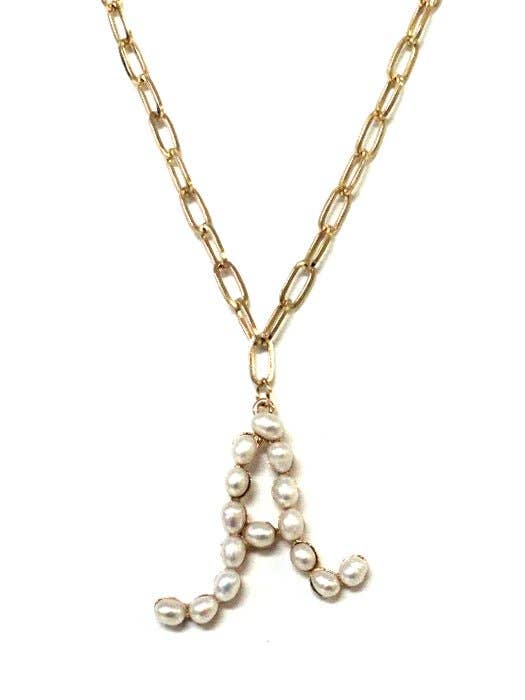 PEARL ESSENCE MONOGRAM NECKLACE by Avenue Zoe featuring freshwater pearls on a gold-tone chain.