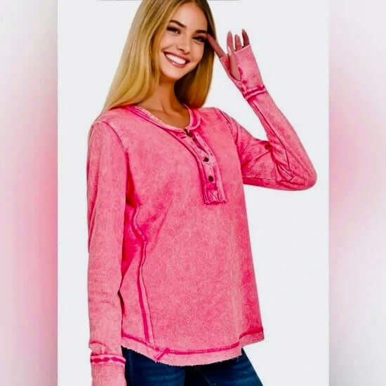 Wanderlight Henley Top (fuchsia) model wearing relaxed long sleeve top with scoop neckline and button-front design.