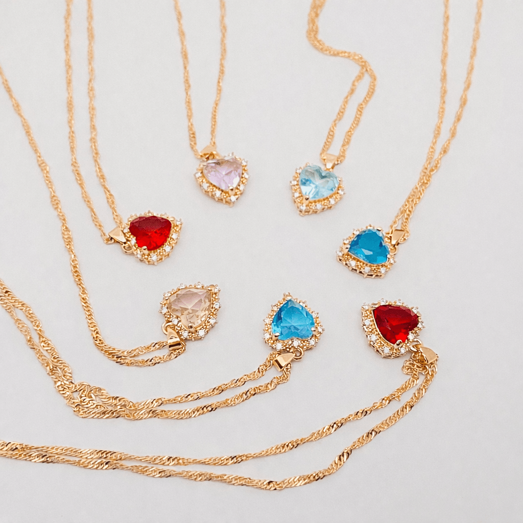 Heart-shaped Pendant Necklace Inlaid Cubic Zirconium with colorful gemstone designs.