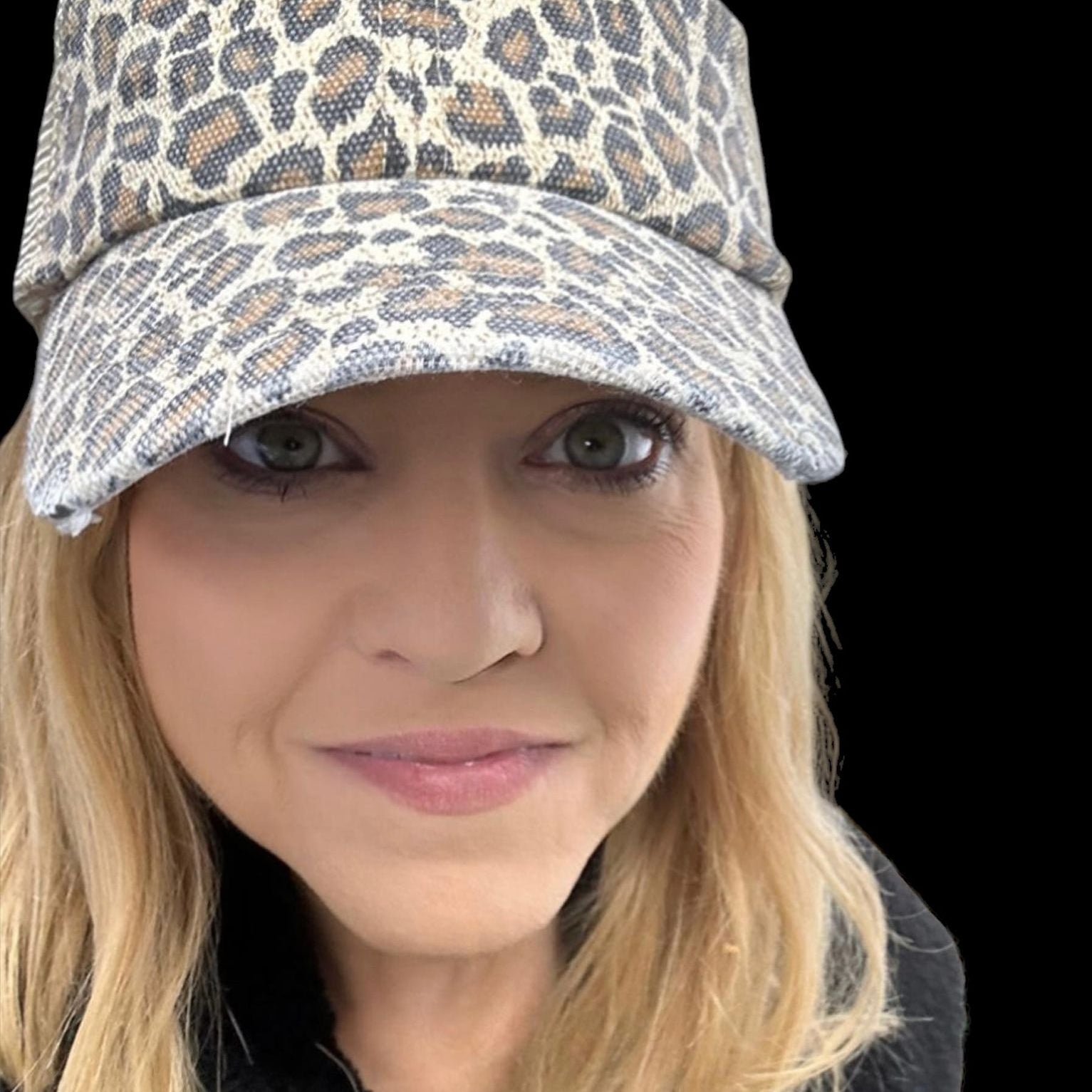 Stylish leopard print trucker hat on a model, showcasing comfort and trendy animal print design.