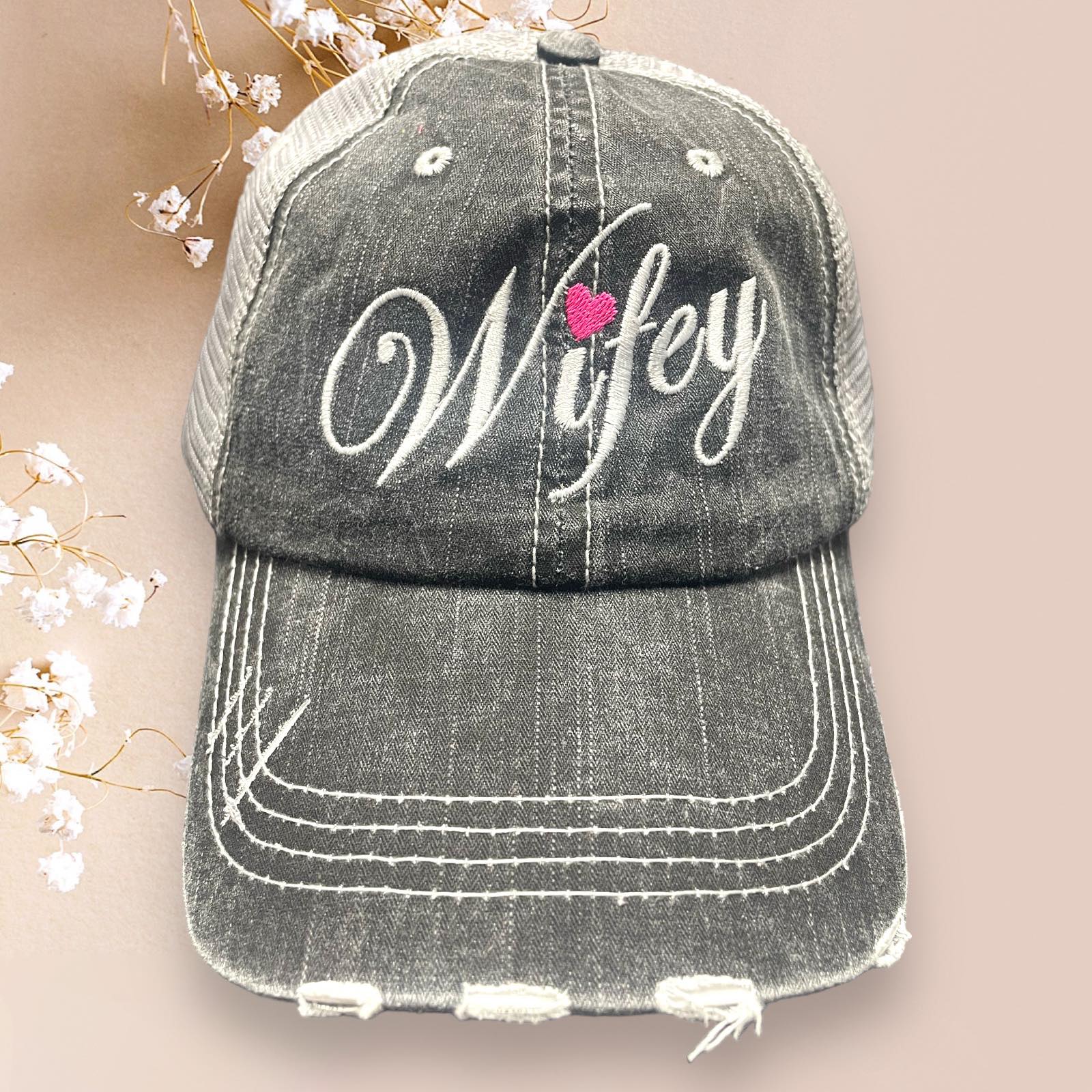Distressed Katydid baseball cap with 'Wifey' embroidered in white and pink, perfect for trendy moms and friends.