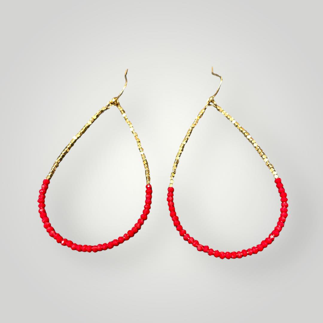 FEELING FANCY RED earrings with dark red beads and gold accents for a stylish look.