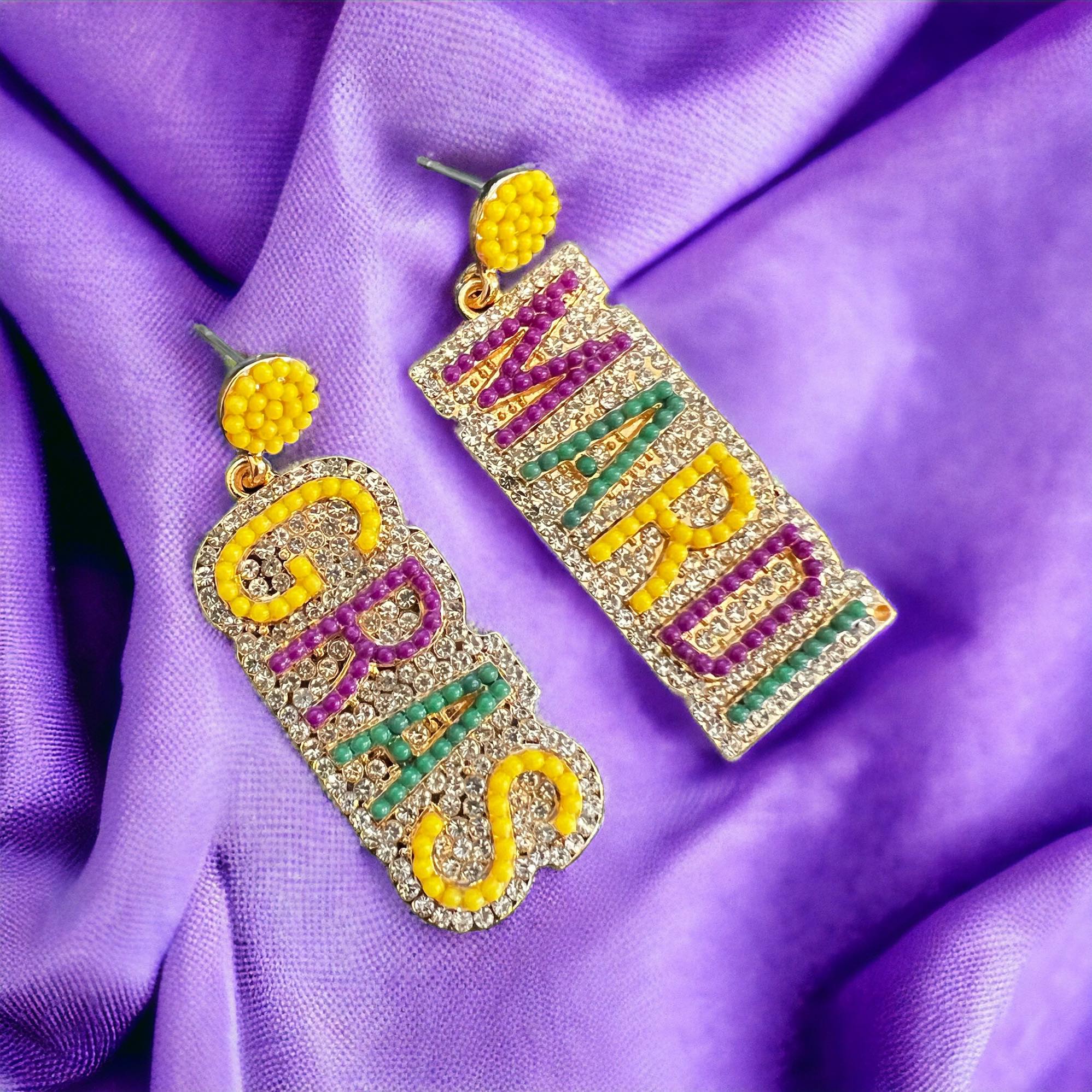 LET THE GOOD TIMES ROLL earrings featuring sparkling rhinestones, Mardi Gras colors, and festive yellow accents.