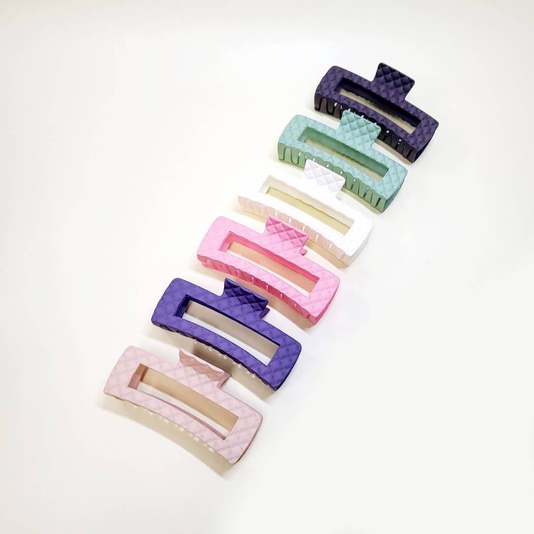 Everyday Luxe XL hair clips in 7 colors with quilted texture for secure hold and stylish hair styling.
