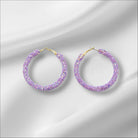 VIOLET SPARKLE hoop earrings featuring violet purple glitter for a stunning accessory that adds sparkle to any outfit.