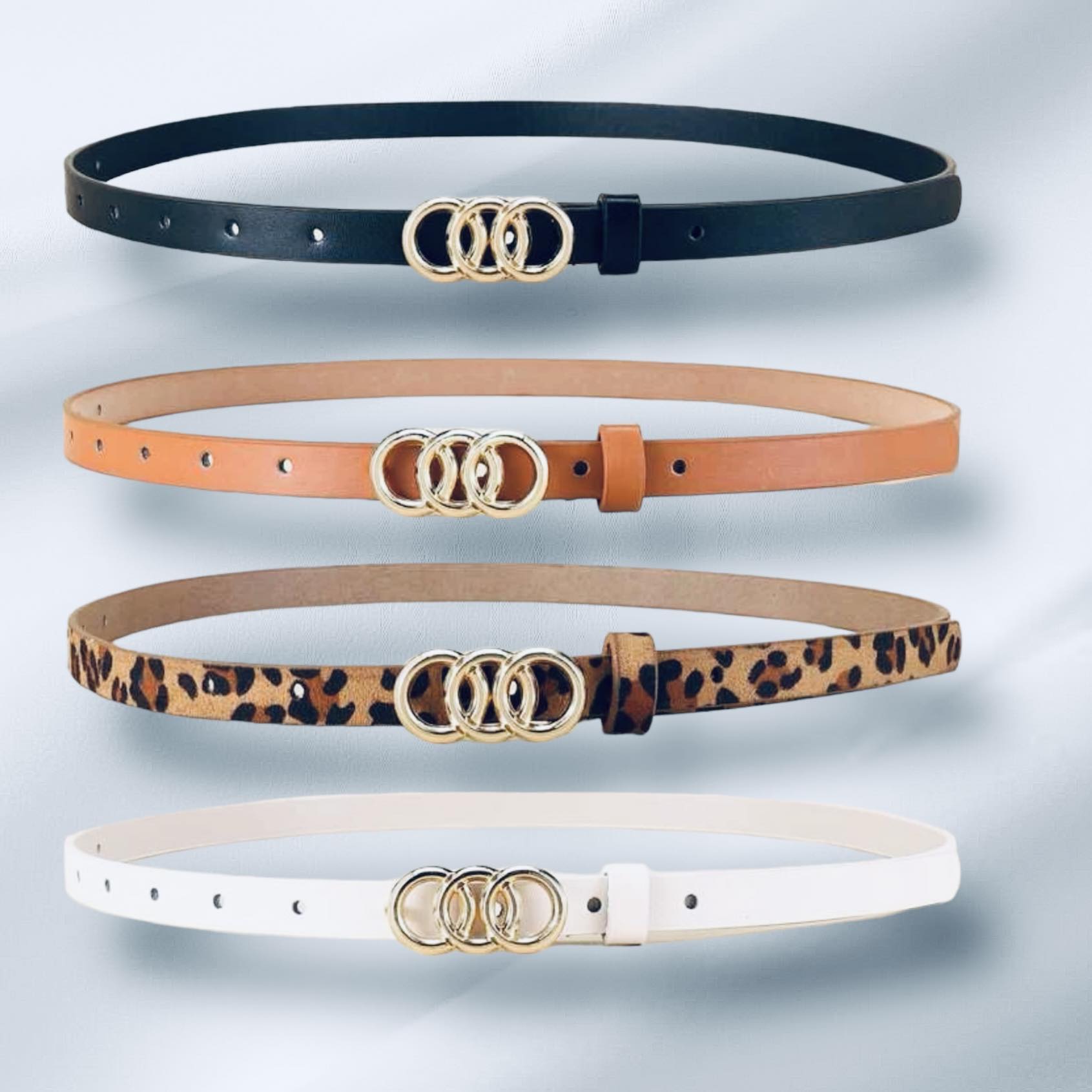 Circles of Life Belts in black, tan, leopard, and white with gold tone overlapping circles for stylish elegance.