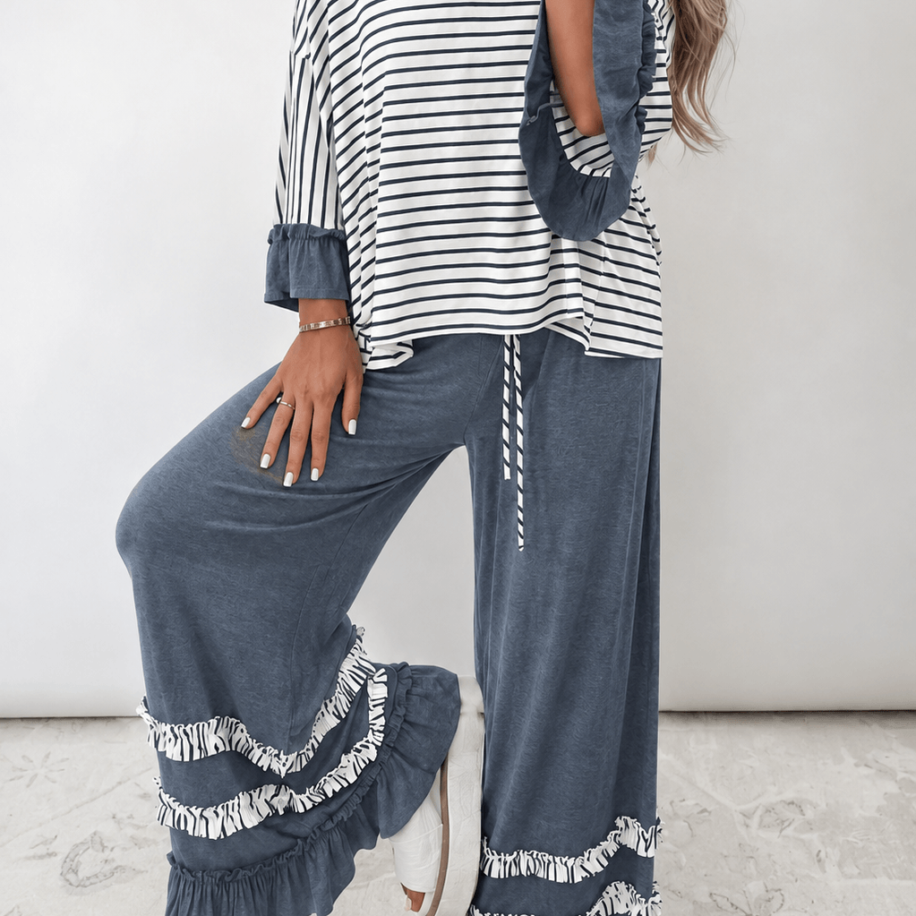 PREORDER - SWEET FLOURISH PANTS SET featuring stylish striped top and ruffle-detail pants in a chic blue color.