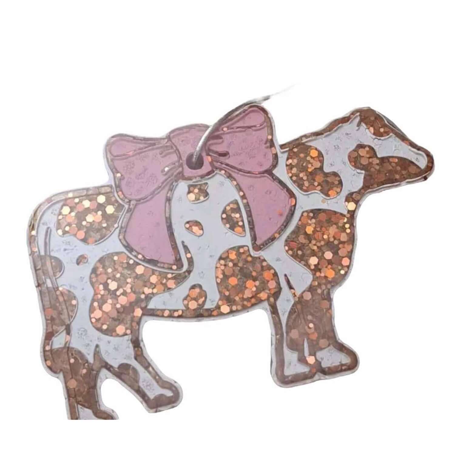 Simply Southern air freshener in cow design with pink bow and glitter, perfect for freshening small spaces.