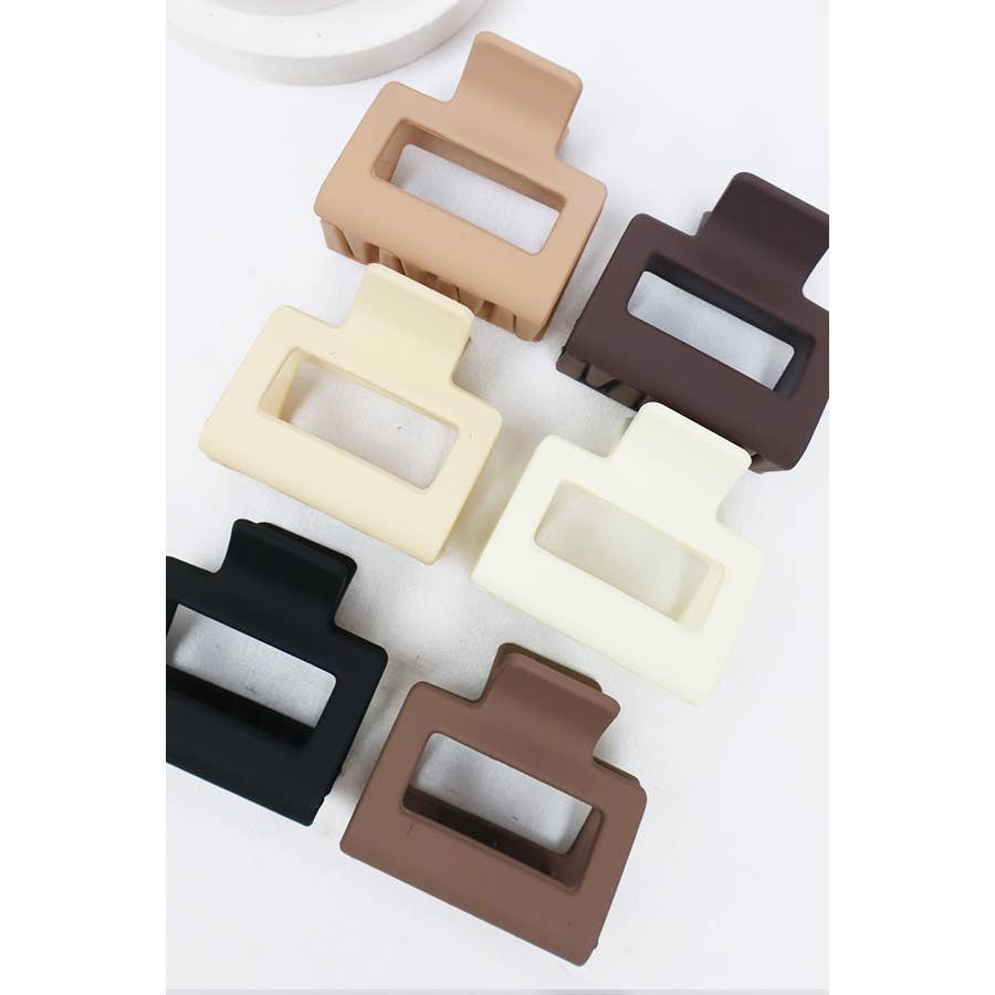 Set of 6 matte hair clips in neutral tones for secure styling without snagging.