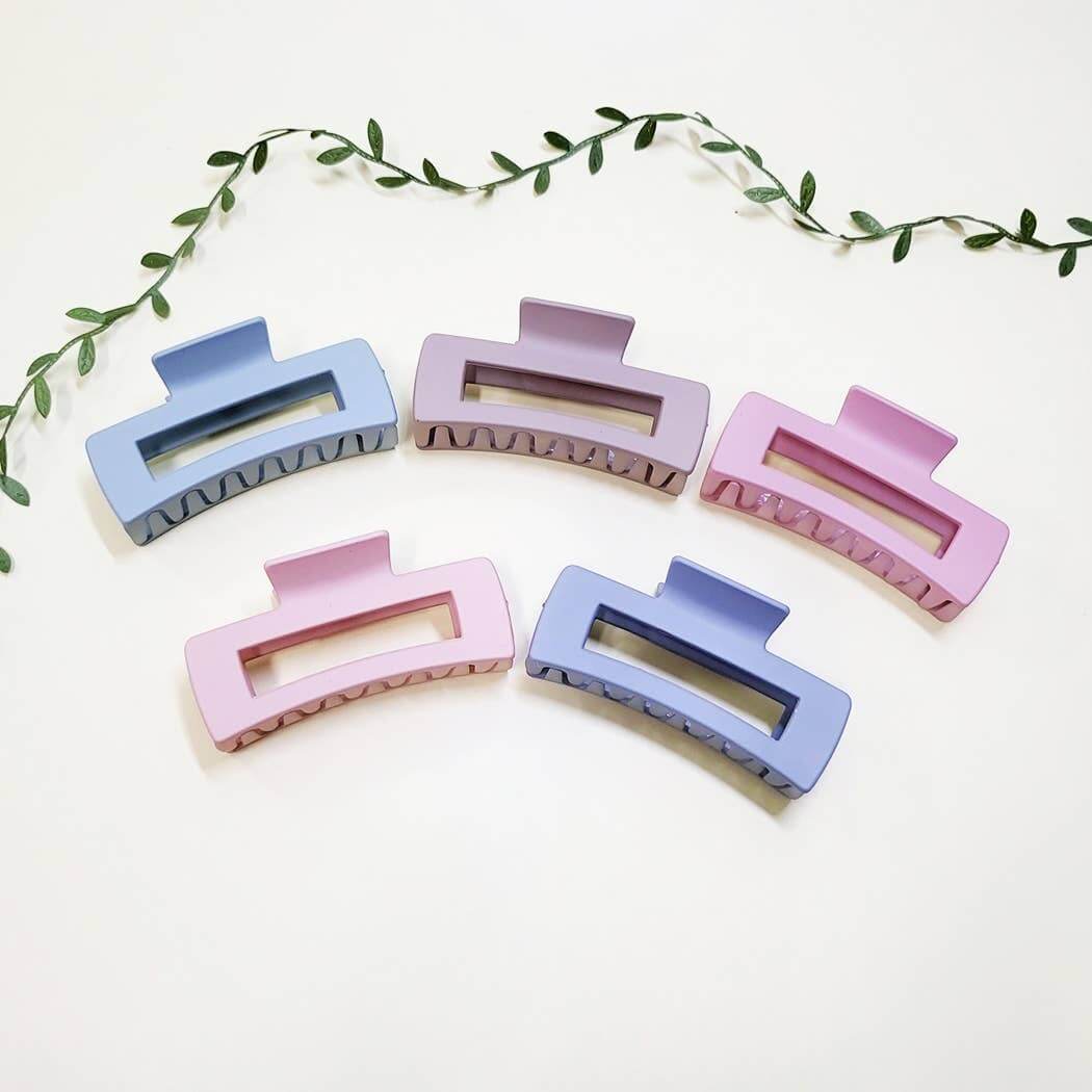 Chic Simplicity large claw clips in pastel colors, matte finish, perfect for stylish hair solutions.