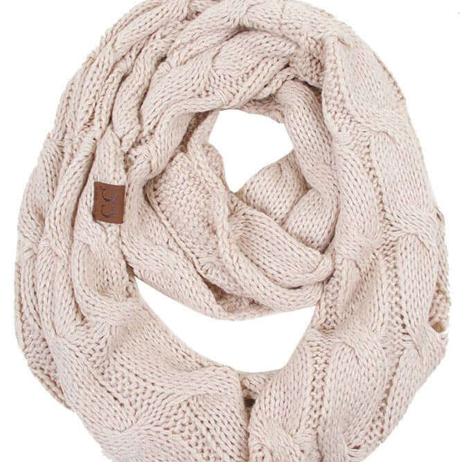 C.C Story Book Warm Beige Knitted Infinity Scarf in cozy cable knit design, 100% acrylic fabric.