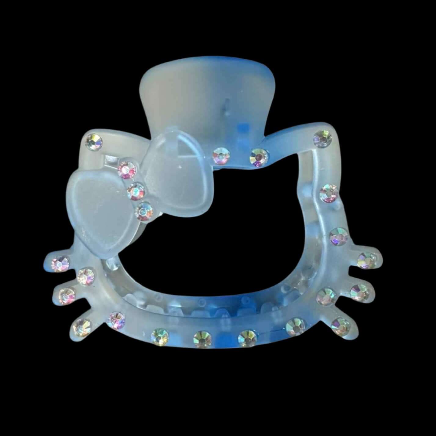 Larger kitten hair clip decorated with rhinestones and a bow, measuring 3.5" x 2.5", perfect for playful hairstyles.