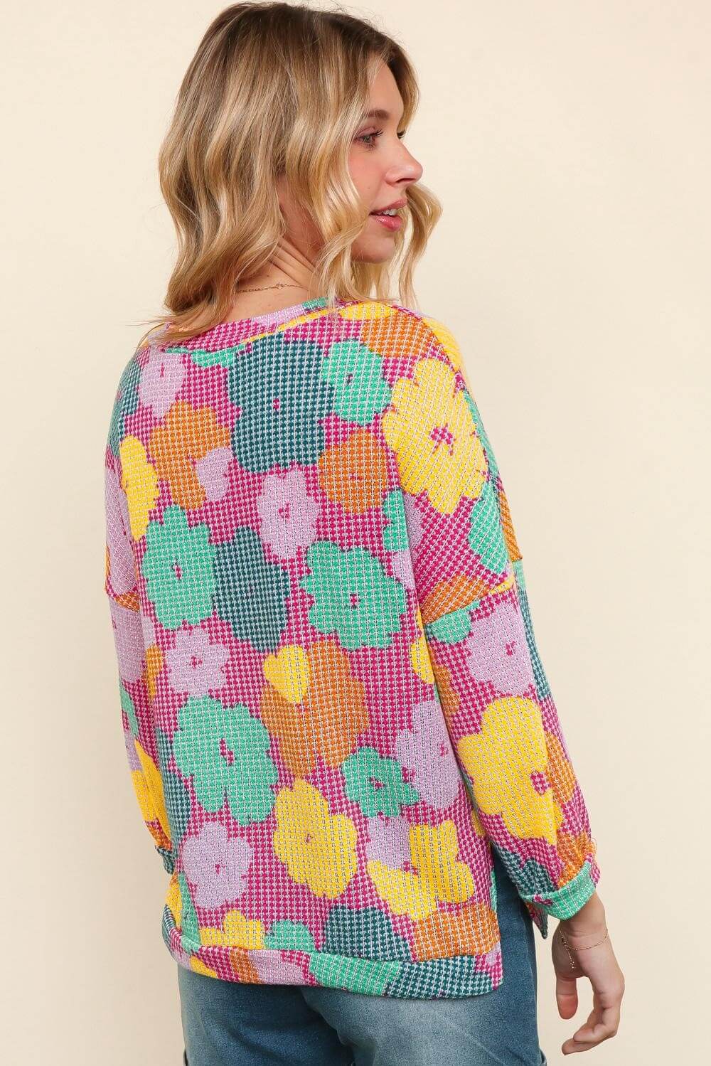 Model wearing the Happy Daze Top by Haptics, featuring a vibrant floral print on a textured waffle knit.