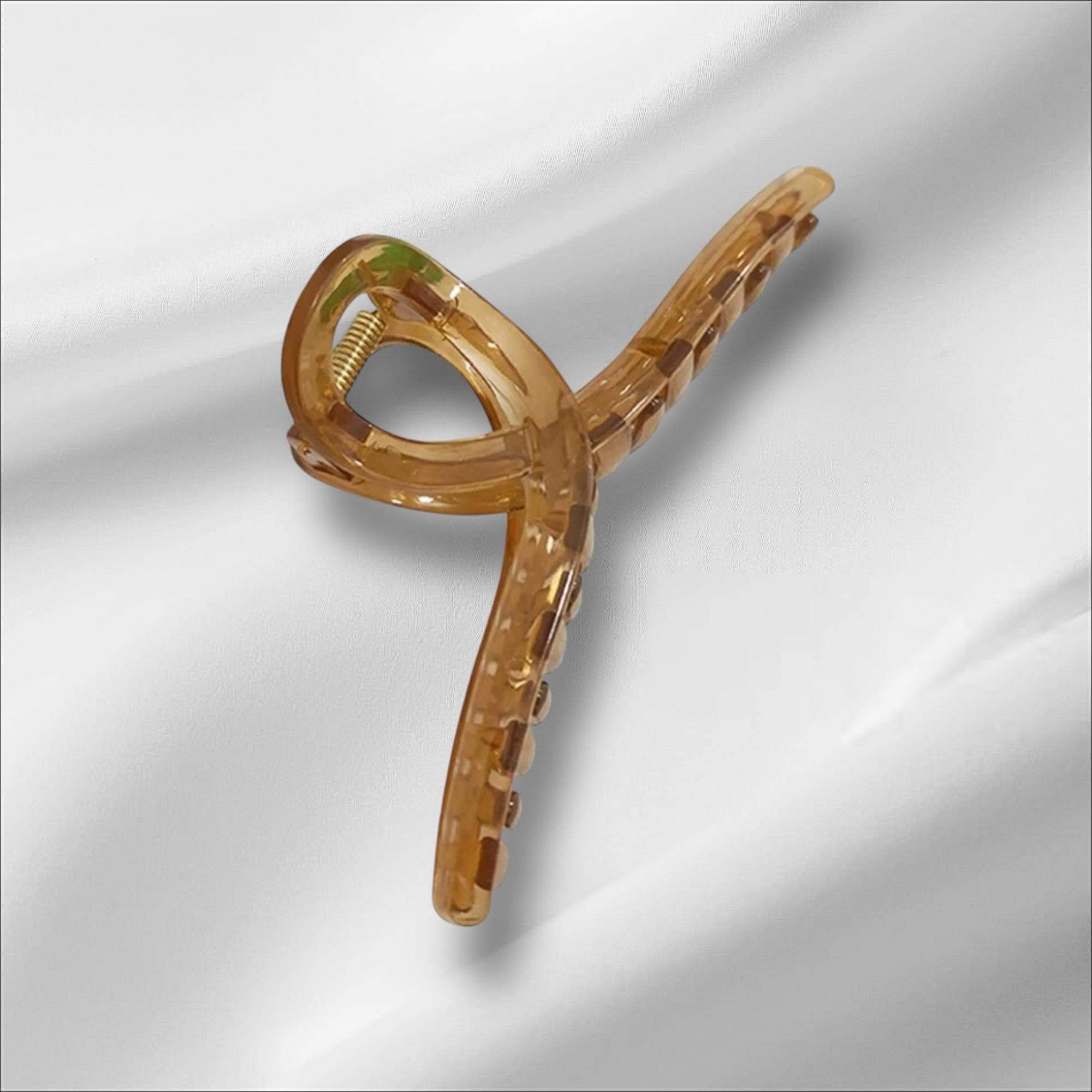 Large translucent jelly-style hair clip for thick, long, or wavy hair with a smooth finish.