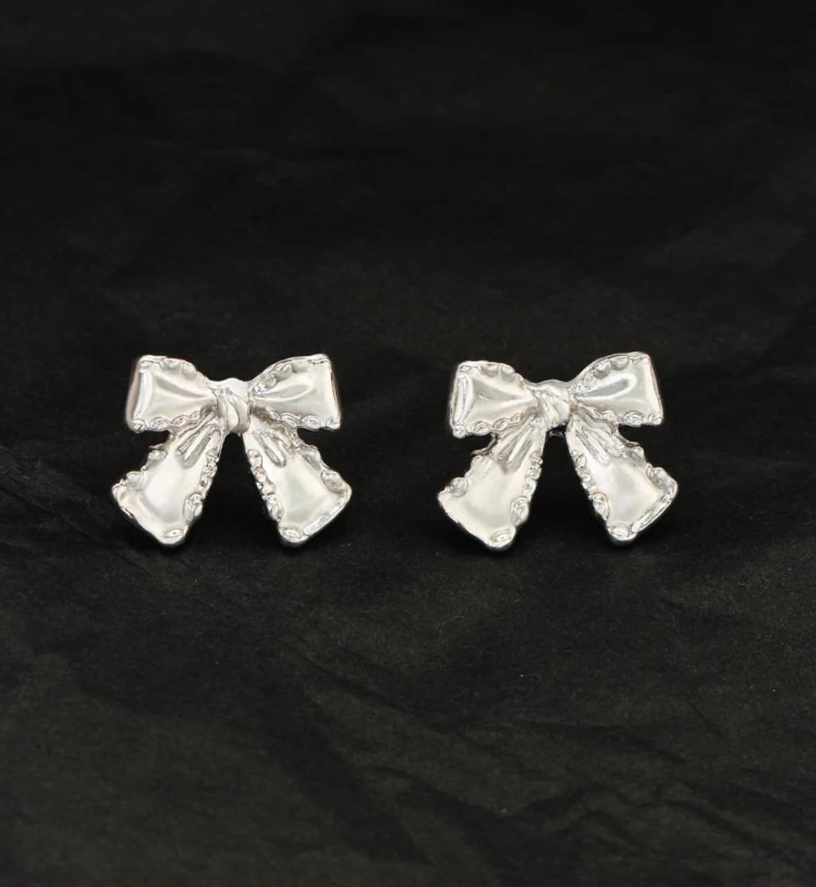 SILVER BOW Stud Earrings from the Vivian-Lu collection, showcasing a chic and elegant bow design.