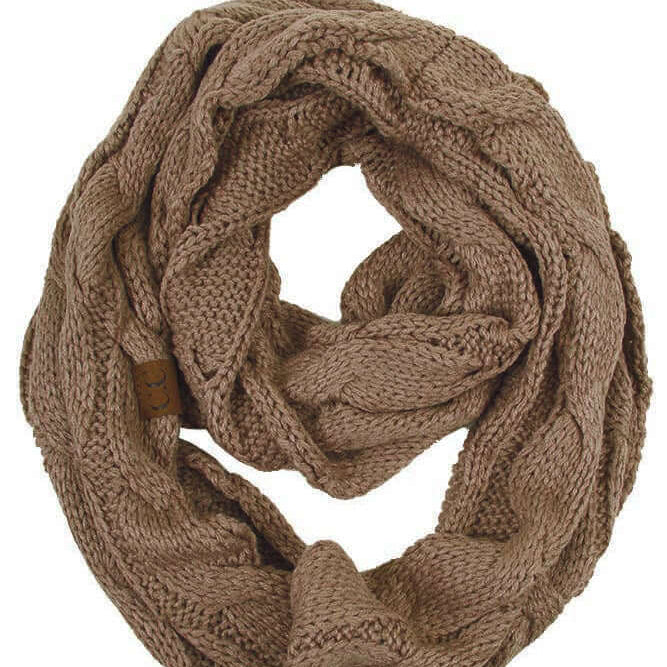 C.C Story Book knitted scarf in taupe, cozy cable knit design, perfect for warmth and style.