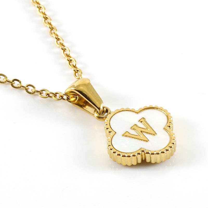 MONOGRAM MOMENTS NECKLACE featuring a gold pendant with the letter 'W' on a delicate chain.