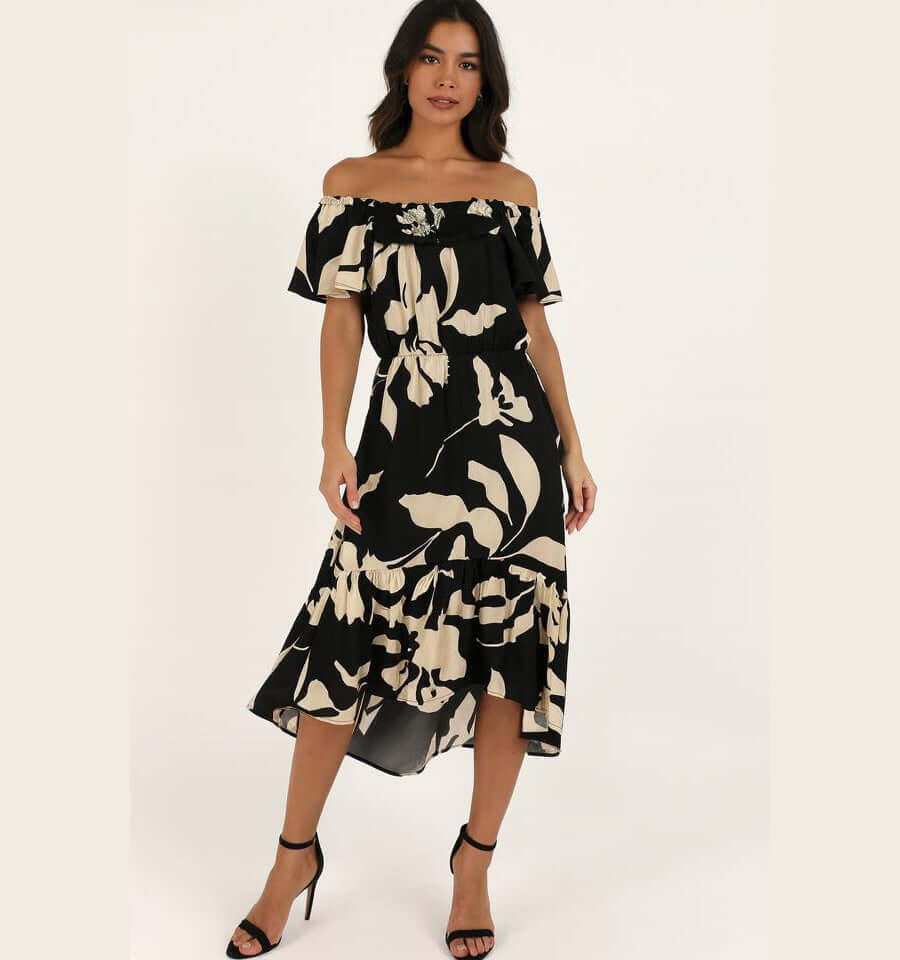 Umgee Dreamways Dress featuring a floral print on black, off-shoulder design, high/low midi length, perfect for stylish occasions.