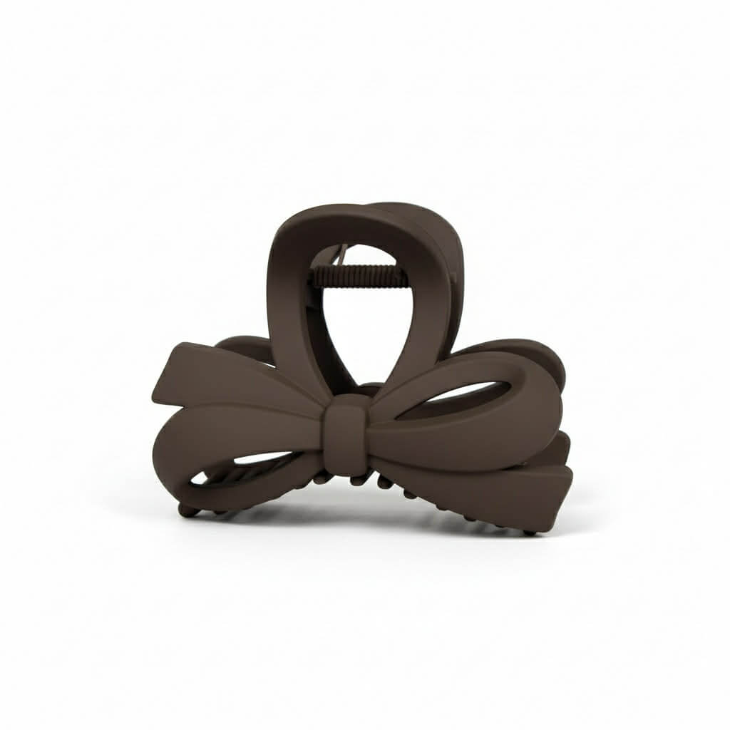 DAILY DARLING BOW HAIR CLIP (6 colors) in brown, featuring a smooth matte finish and timeless bow design.