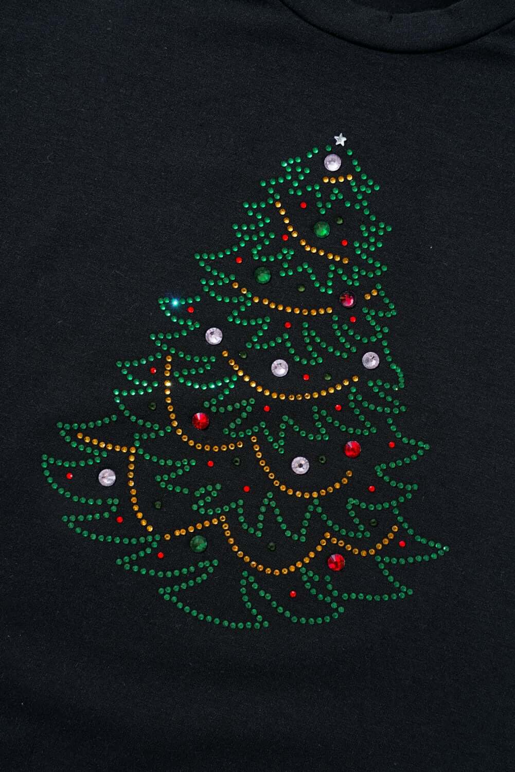 Studded Christmas tree design on a black t-shirt, featuring colorful gems and festive detail.