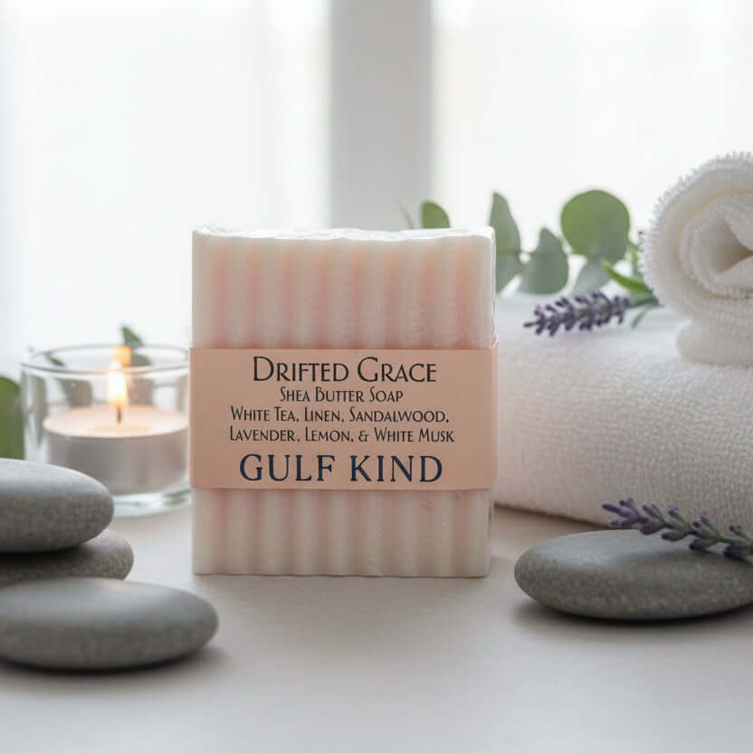 Drifted Grace Shea Butter Soap by Gulf Kind on a spa setting with candles and stones for relaxation.