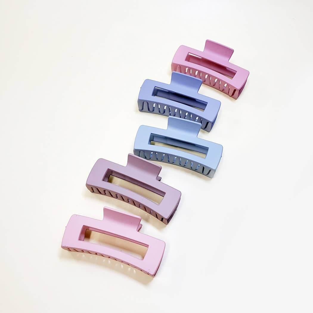 Chic Simplicity large claw clips in pink and blue, 4-inch matte finish, perfect for stylish hair updos.