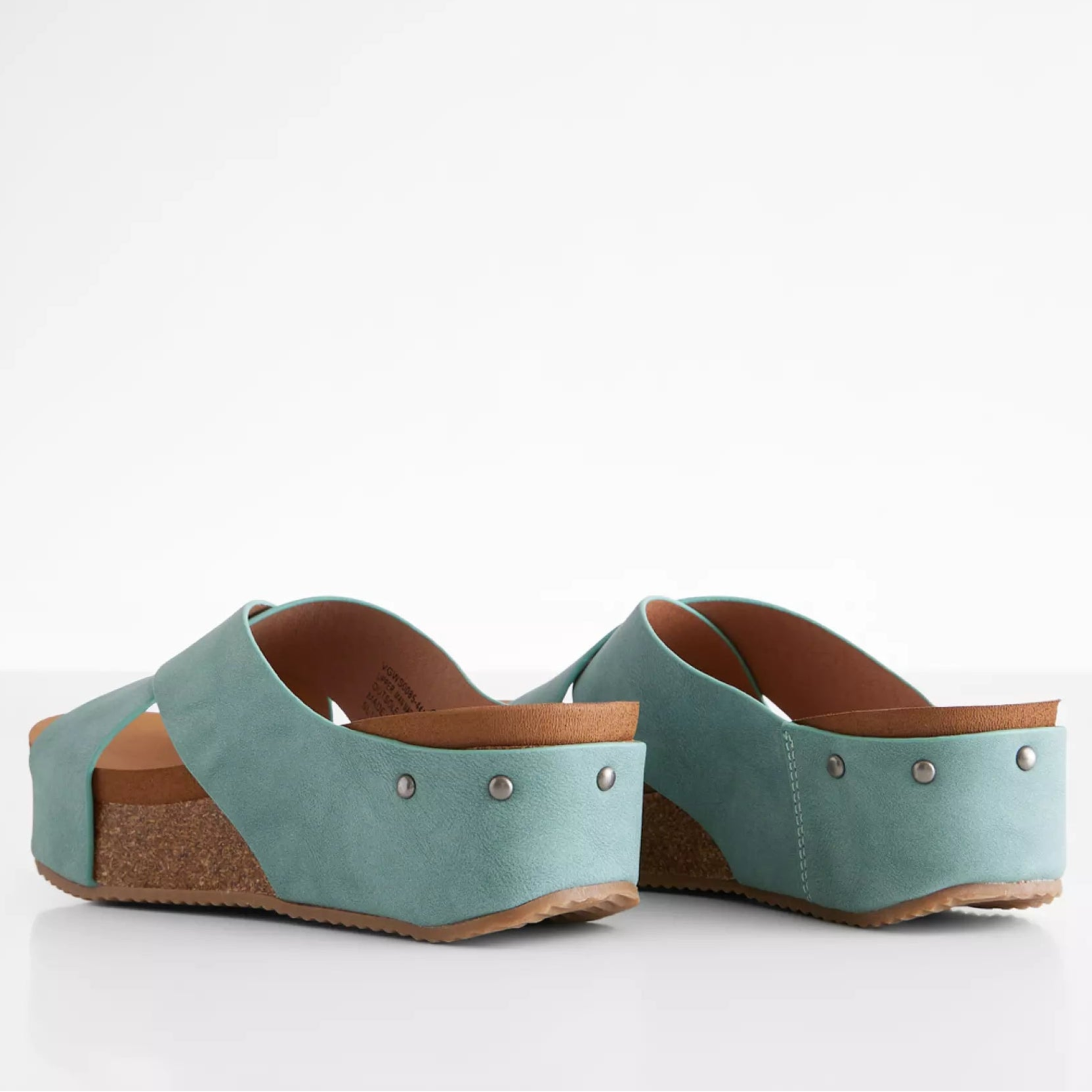 Teal cork wedge sandals by Very G with distressed straps and studded side details.