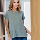PURELY YOU TOP (Ash Jade) model wearing a relaxed fit knit top with rolled sleeves, showcasing comfy and chic style.