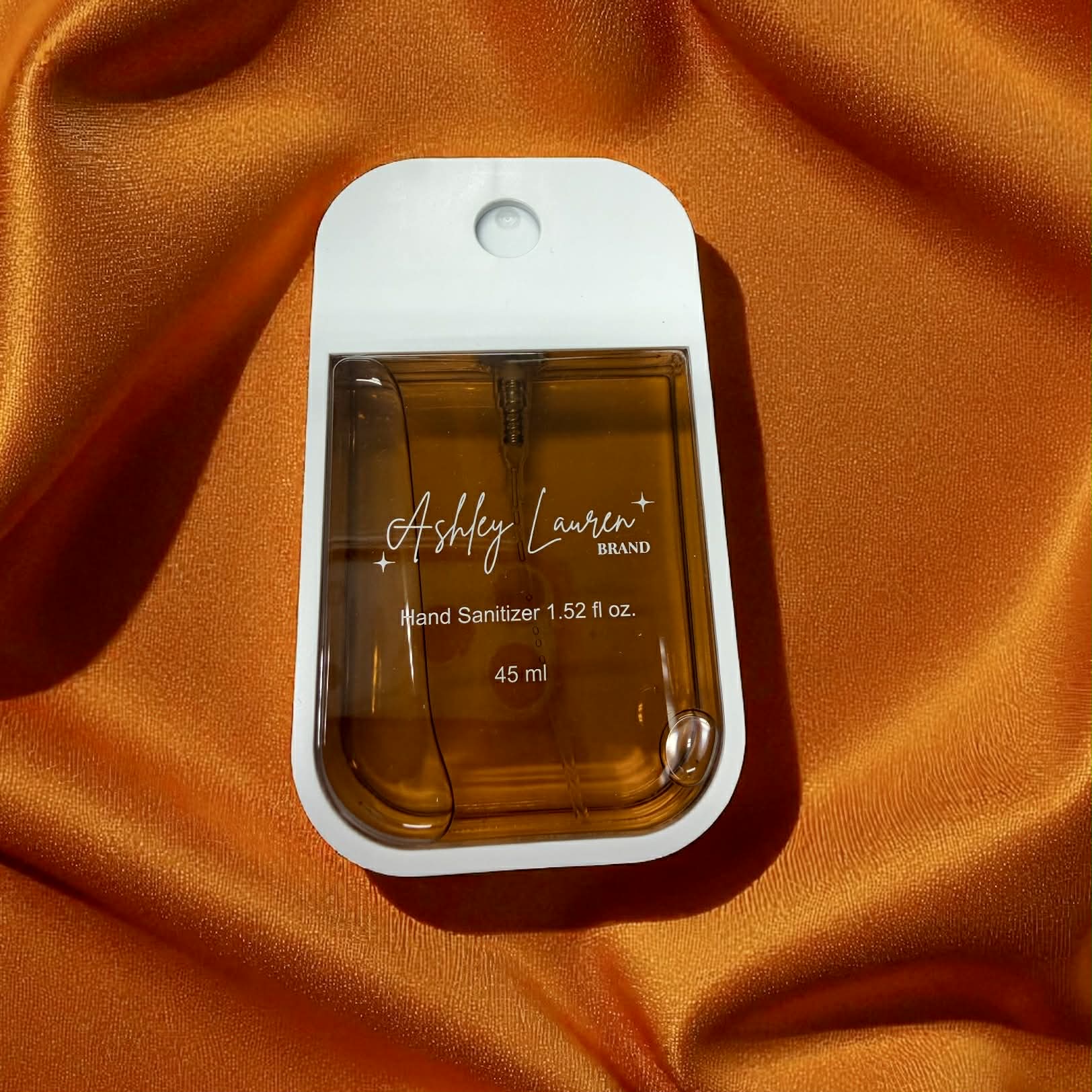 ASHLEY LAURA XL CARAMEL HAND SANITIZER in a stylish bottle with a sweet caramel scent and antibacterial protection.