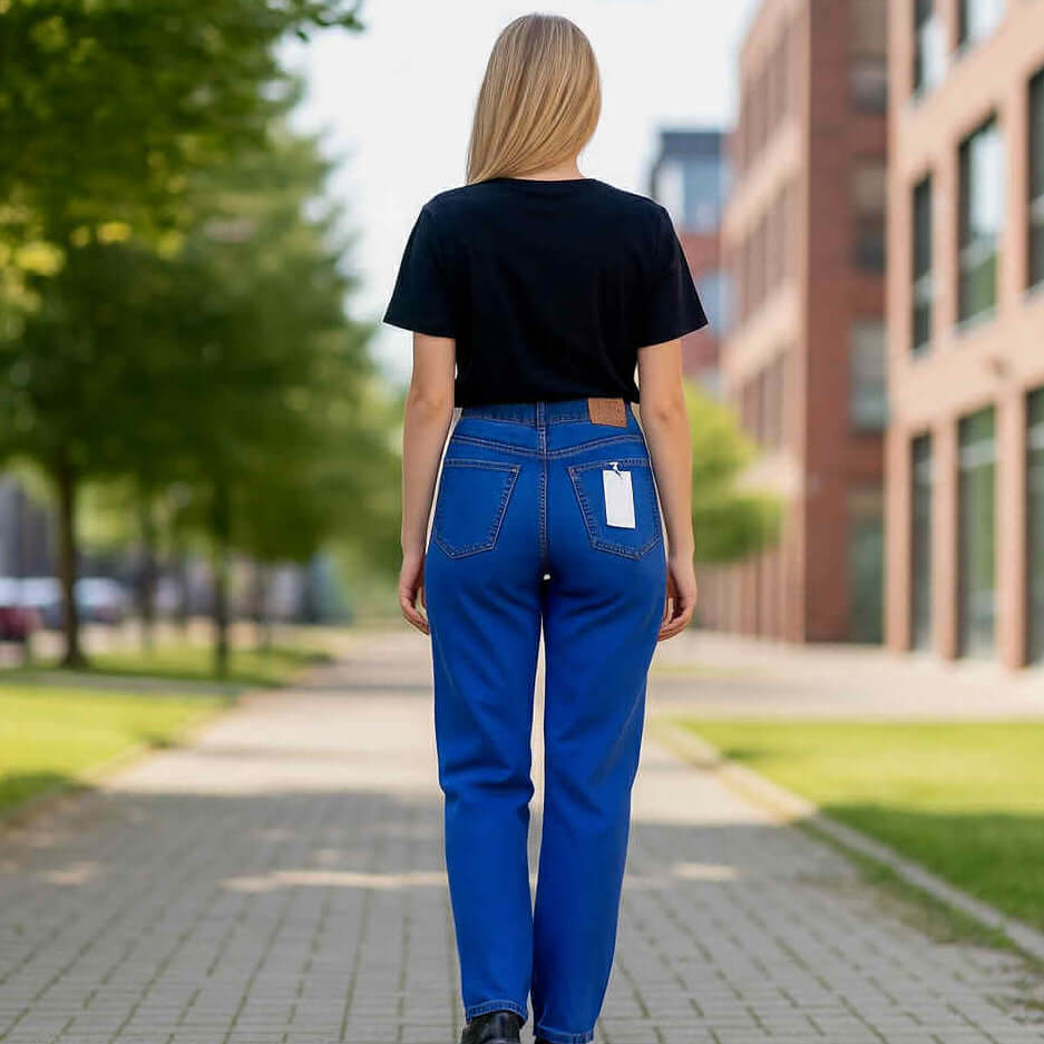 Model wearing LILA HIGH RISE DAD JEANS, viewed from behind, showcasing the stylish high rise fit and classic design.