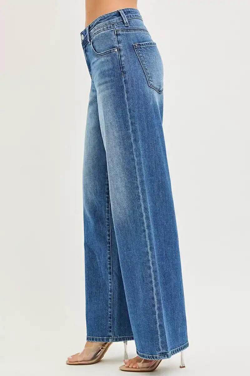 Side view of RISEN KAI WIDE LEG JEANS showcasing relaxed fit and midrise design.