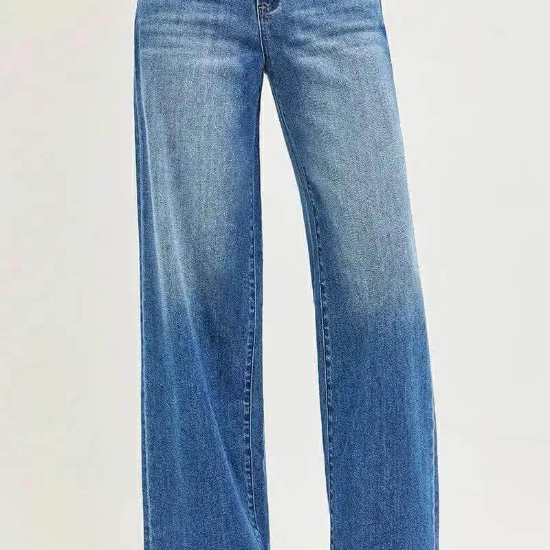 Risen Kai Wide Leg Jeans featuring a relaxed fit and midrise waist, shown in blue denim color.