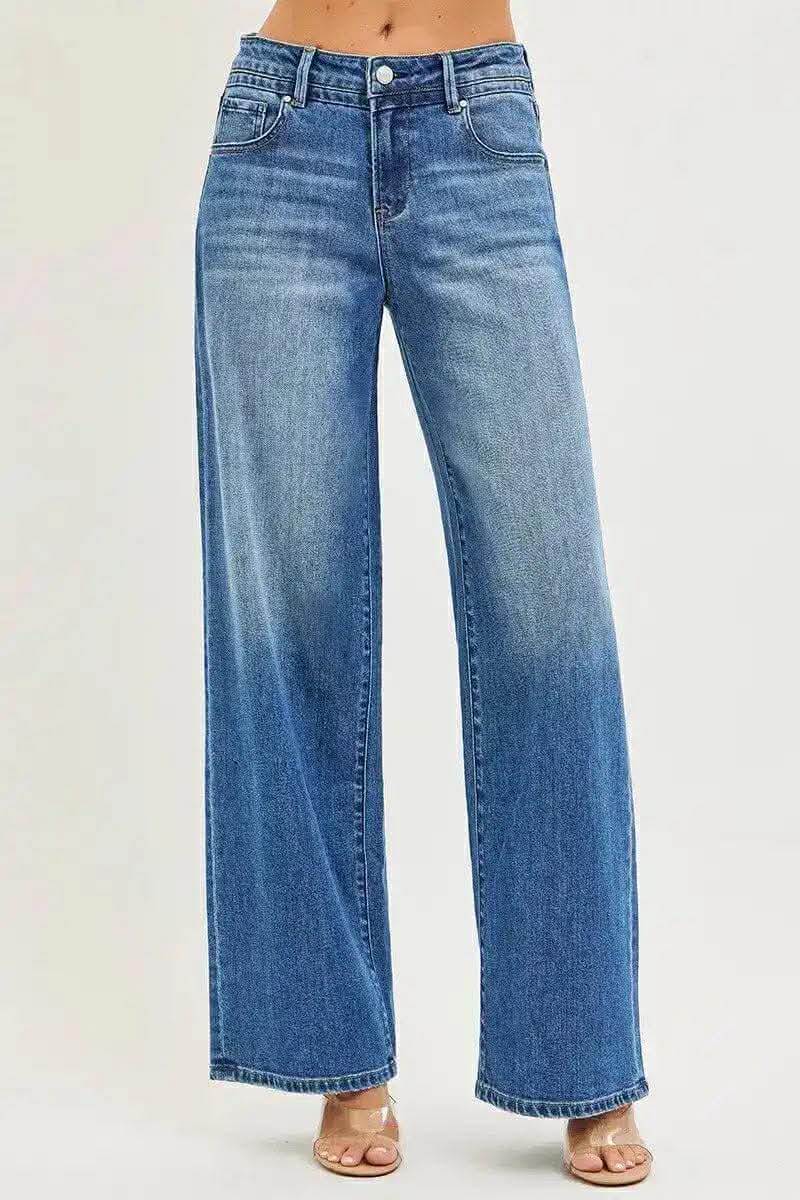 Risen Kai Wide Leg Jeans featuring a relaxed fit and midrise waist, shown in blue denim color.