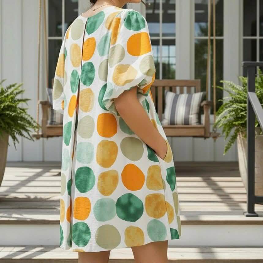ON THE DOT DRESS - Umgee in vibrant yellow and green abstract dot print, featuring bubble sleeves and side pockets.