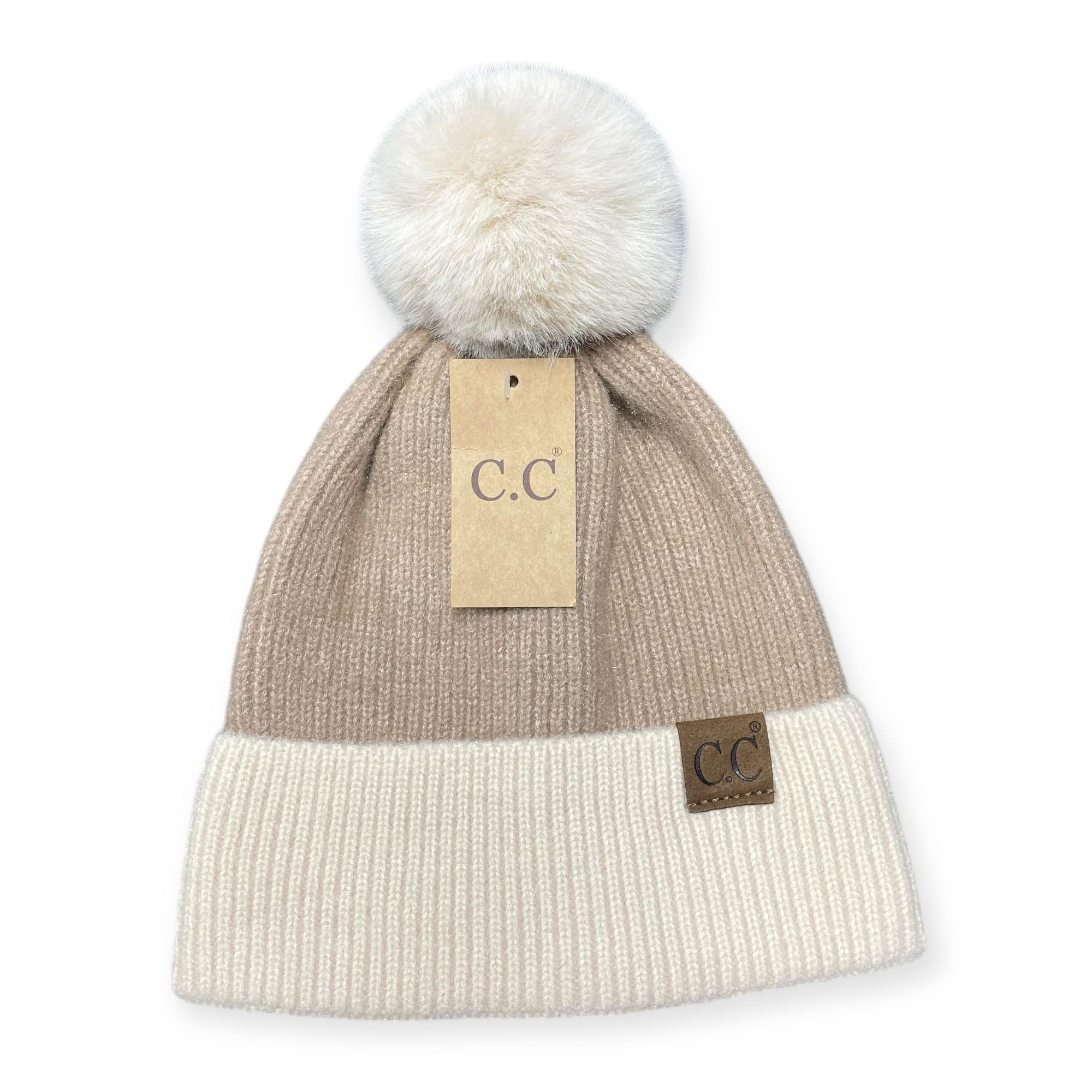 OH SO SOFT BEANIE by C.C. in tan and beige with a fur pom pom and suede patch, perfect for winter fashion.