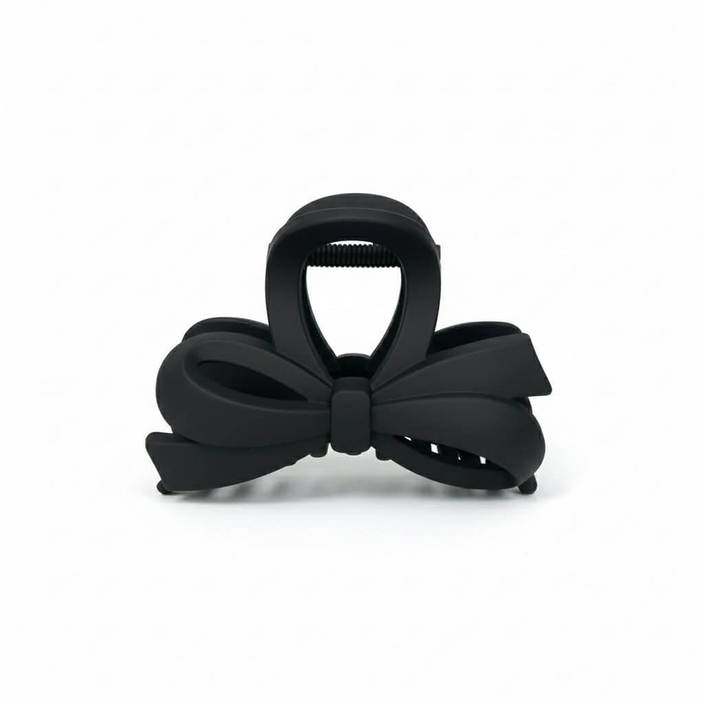 DAILY DARLING BOW HAIR CLIP (6 colors) in sleek black, featuring an elegant bow design for stylish hair accessories.