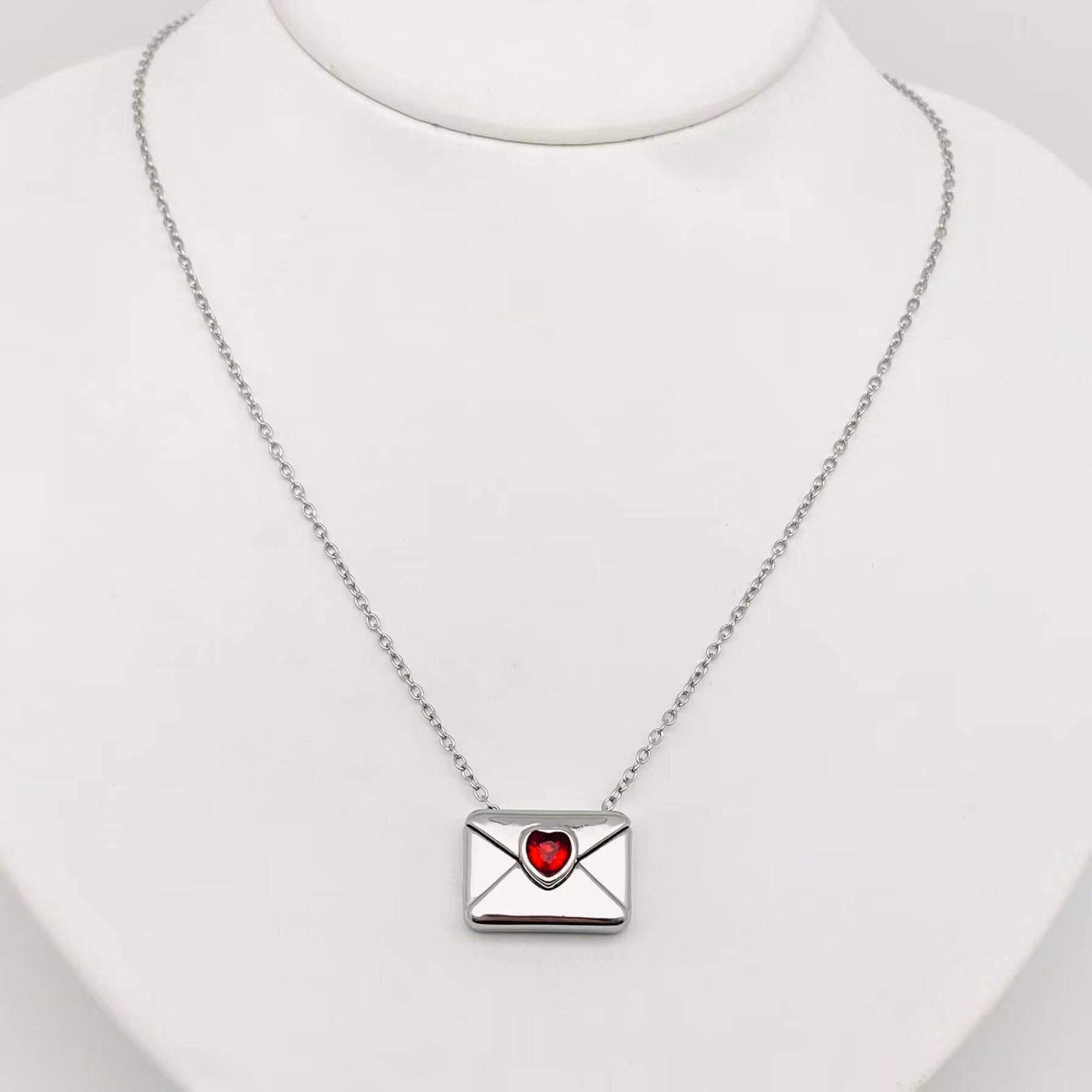 LOVE LETTER NECKLACE featuring an envelope pendant with a heart-shaped cubic zirconia, perfect for gifting or daily wear.