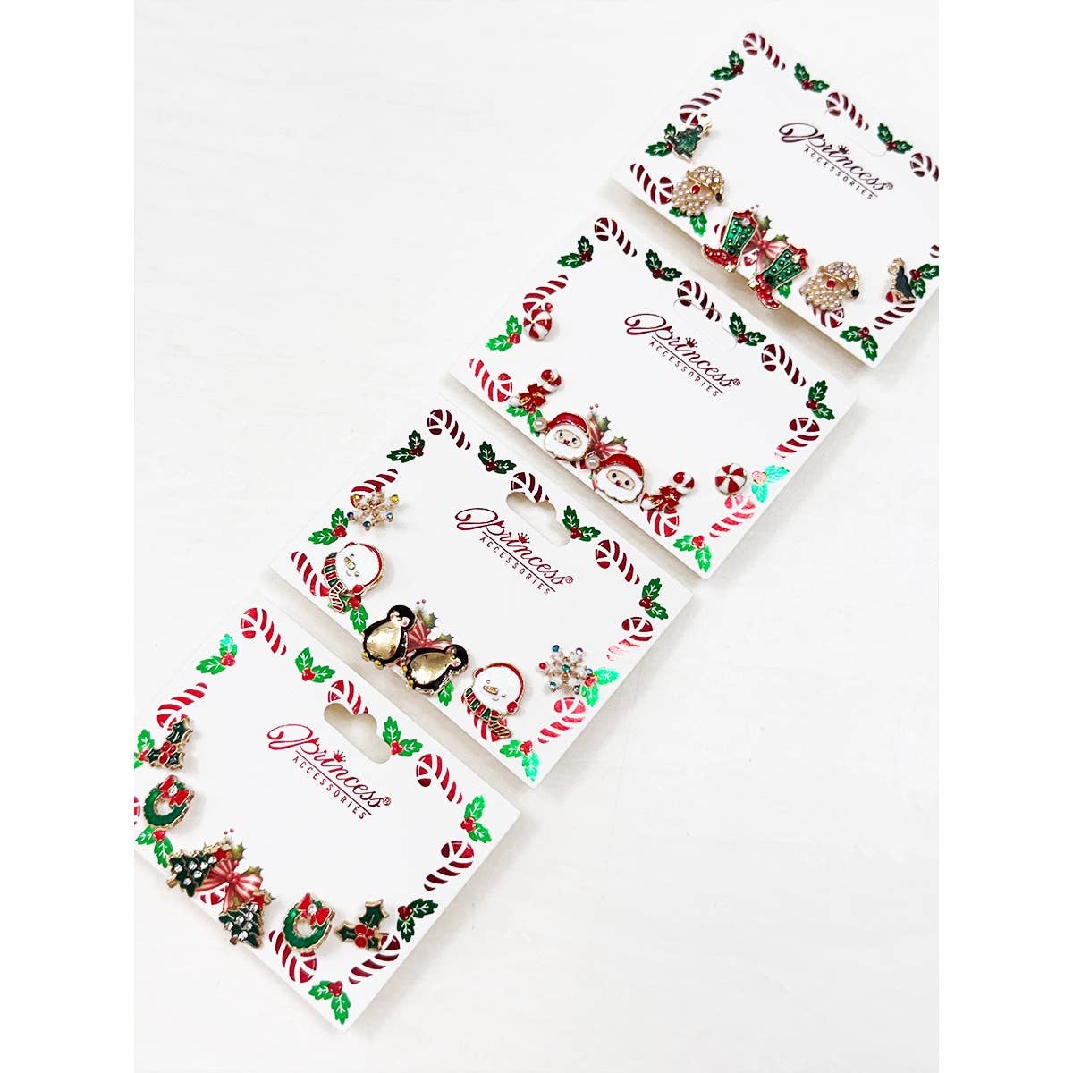 Cute Christmas Theme Sparkly Earrings displayed on festive cards in assorted Christmas designs.