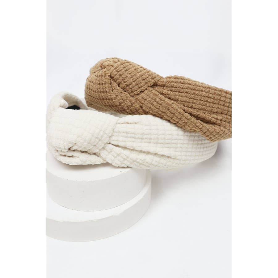 Knot Your Average Headband in cream and tan, featuring a waffle texture for comfortable and stylish wear.